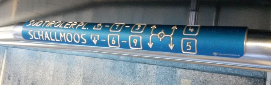 [Salzburg]At Salzburg Hauptbahnhof the stair rail from the platform down to the concourse has tactile information showing other platforms and station exits along with braille
