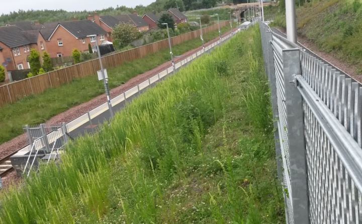 [Borders Railway]It's a long way up from Newtongrange station to the Scottish Mining Museum. The expensive zig-zag ramps were provided for wheelchair users but presumably the business case didn't justify direct stairs so that able-bodied people could save several minutes.